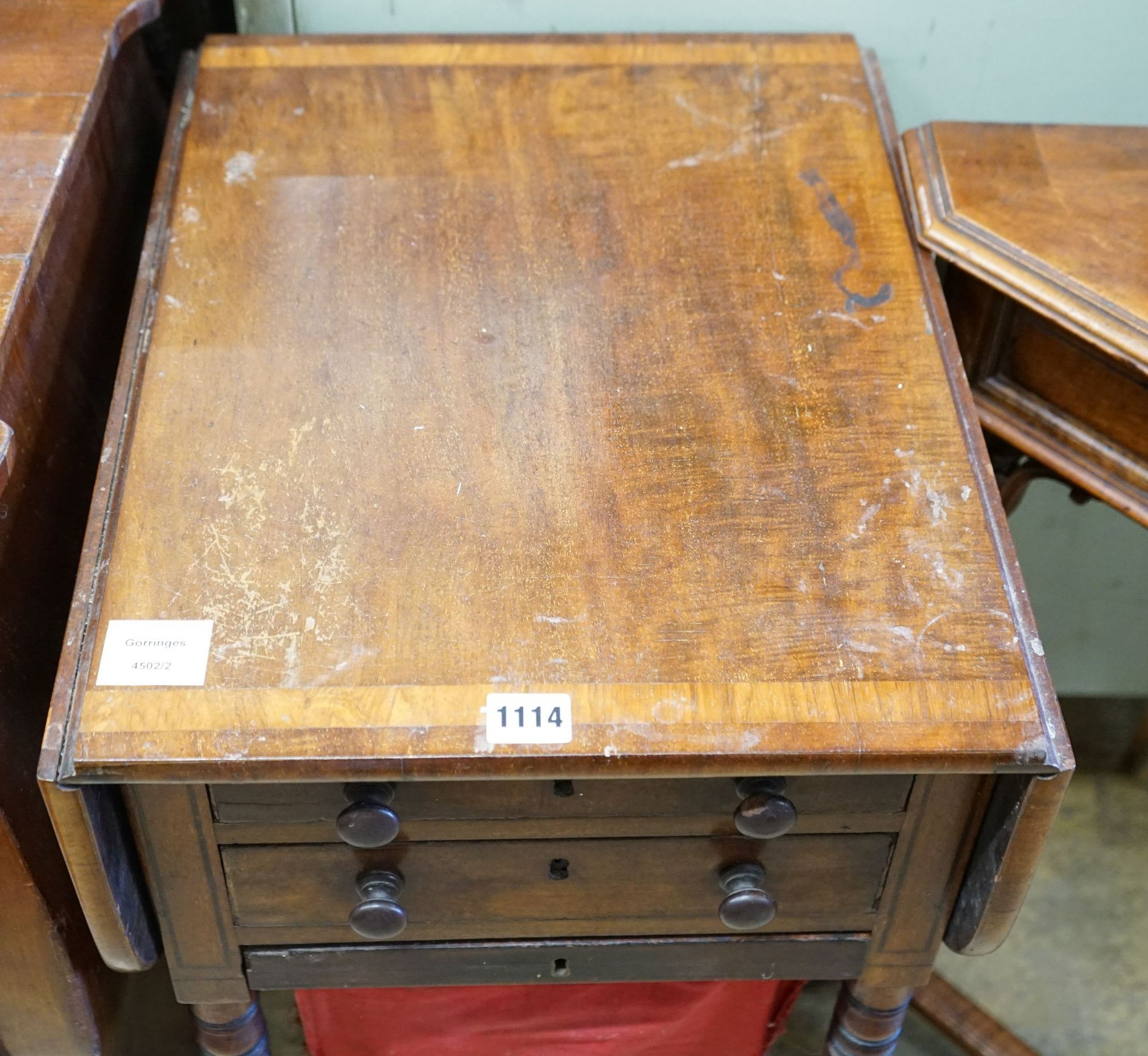 A Regency mahogany drop flap work table, width 39cm, depth 49cm, height 75cm